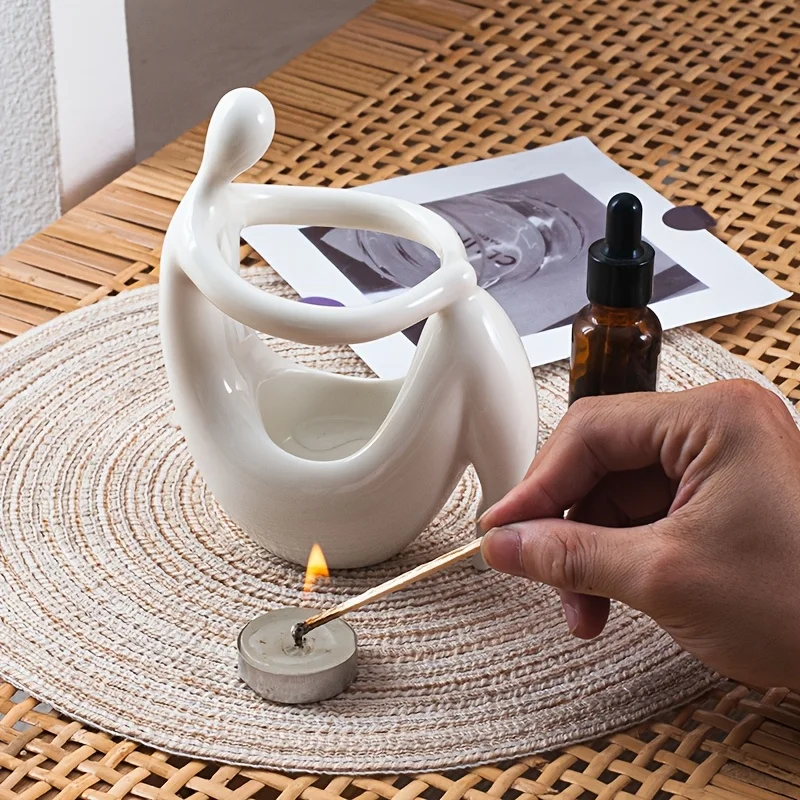 مبخرة سيراميك على شكل جسم الإن - مراجعة Home Fragrance Oils For Oil Burners وسعره
